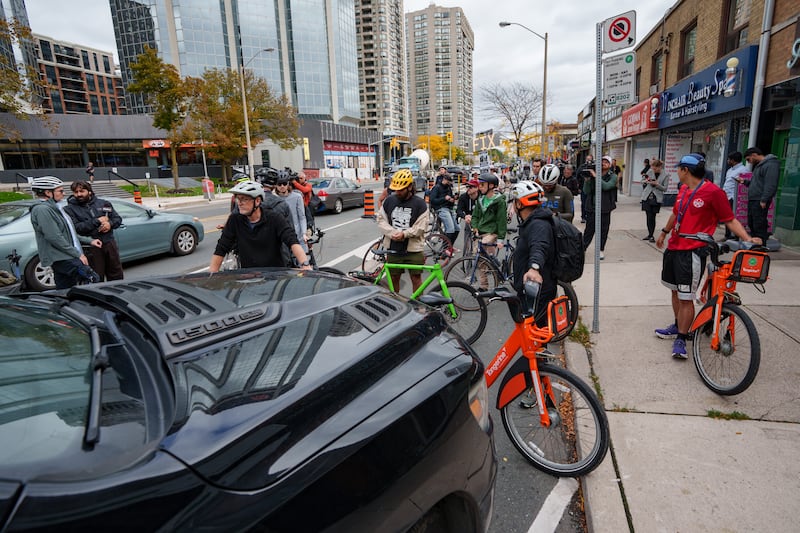 Battle over bike lanes: Standoff on Bloor Street West as advocates block removal work