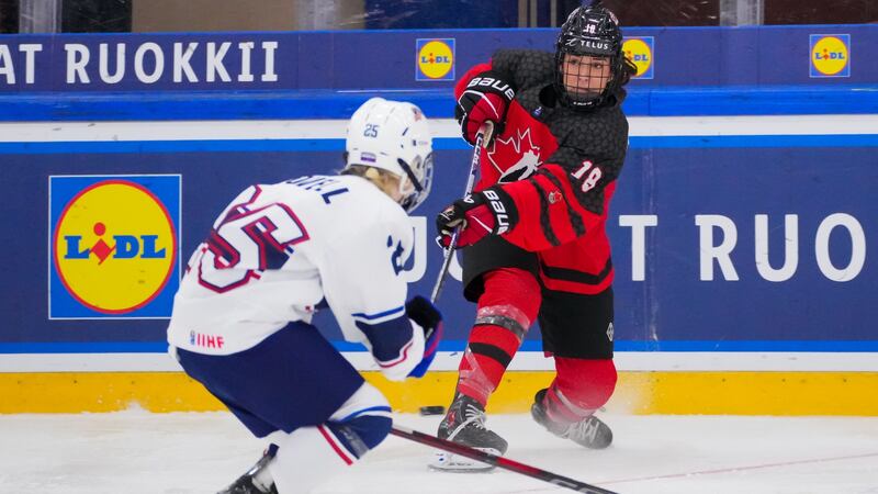 Team Canada players Rosalie Tremblay and Hayley MacDonald are seen at the 2025 IIHF U18 Women’s World Championship. (IIHF/Images on Ice)