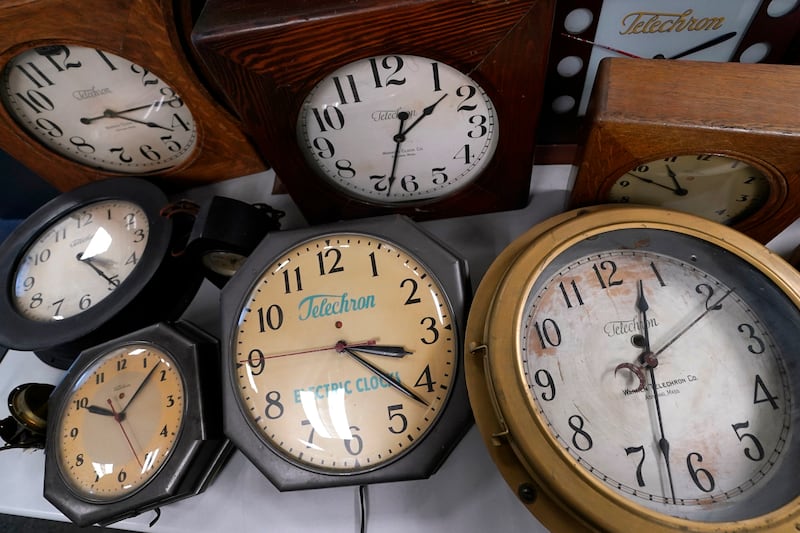 A selection of vintage clocks are displayed at Electric Time Company in Medfield, Mass., on Nov. 1, 2022. (Charles Krupa / AP Photo)