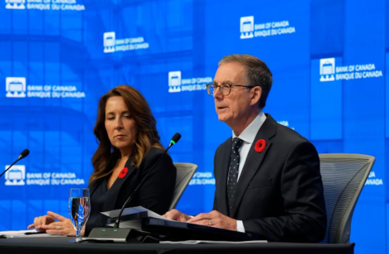 Deputy Governor Carolyn Rogers looks on as Bank of Canada Governor Tiff Macklem delivers his opening remarks during a news conference in Ottawa, Wednesday, Oct. 28, 2026. THE CANADIAN PRESS/Adrian Wyld