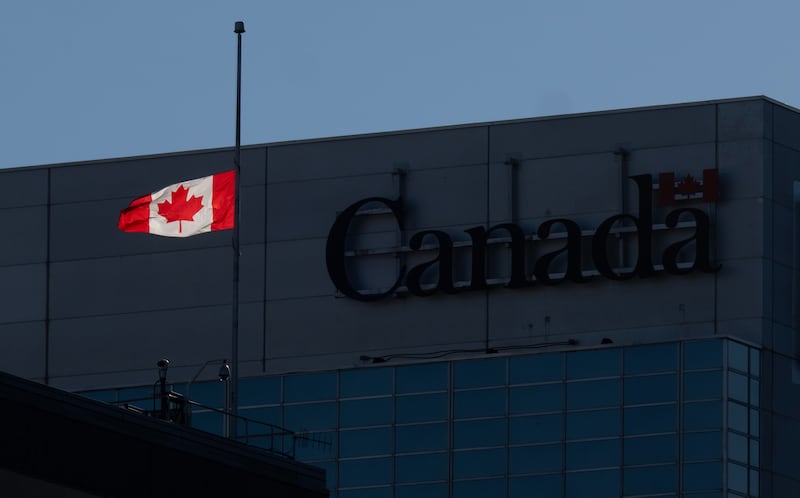 Flags on government buildings fly at half mast to mark the incident at CFB Wainwright, in Ottawa, Monday, Oct. 19, 2026. THE CANADIAN PRESS/Adrian Wyld