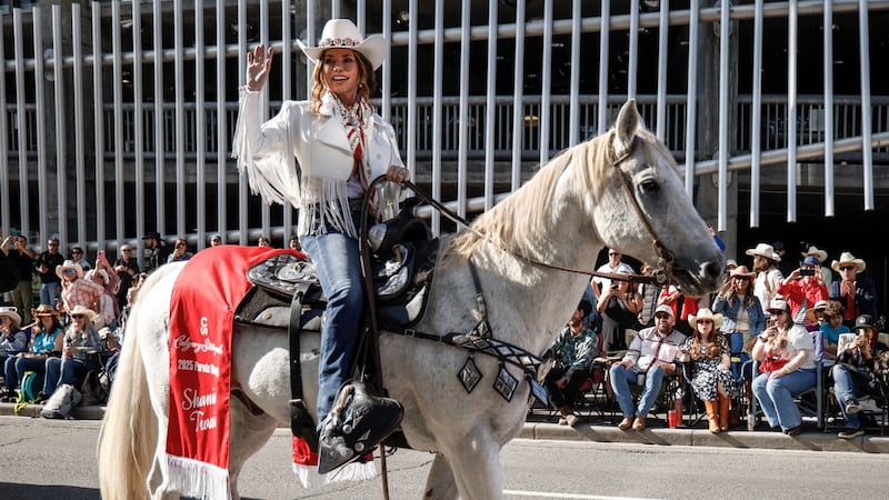Parade Marshal Shania Twain rides a horse during the Calgary Stampede parade in Calgary, Alta., Friday, July 4, 2025. (THE CANADIAN PRESS/Jeff McIntosh)