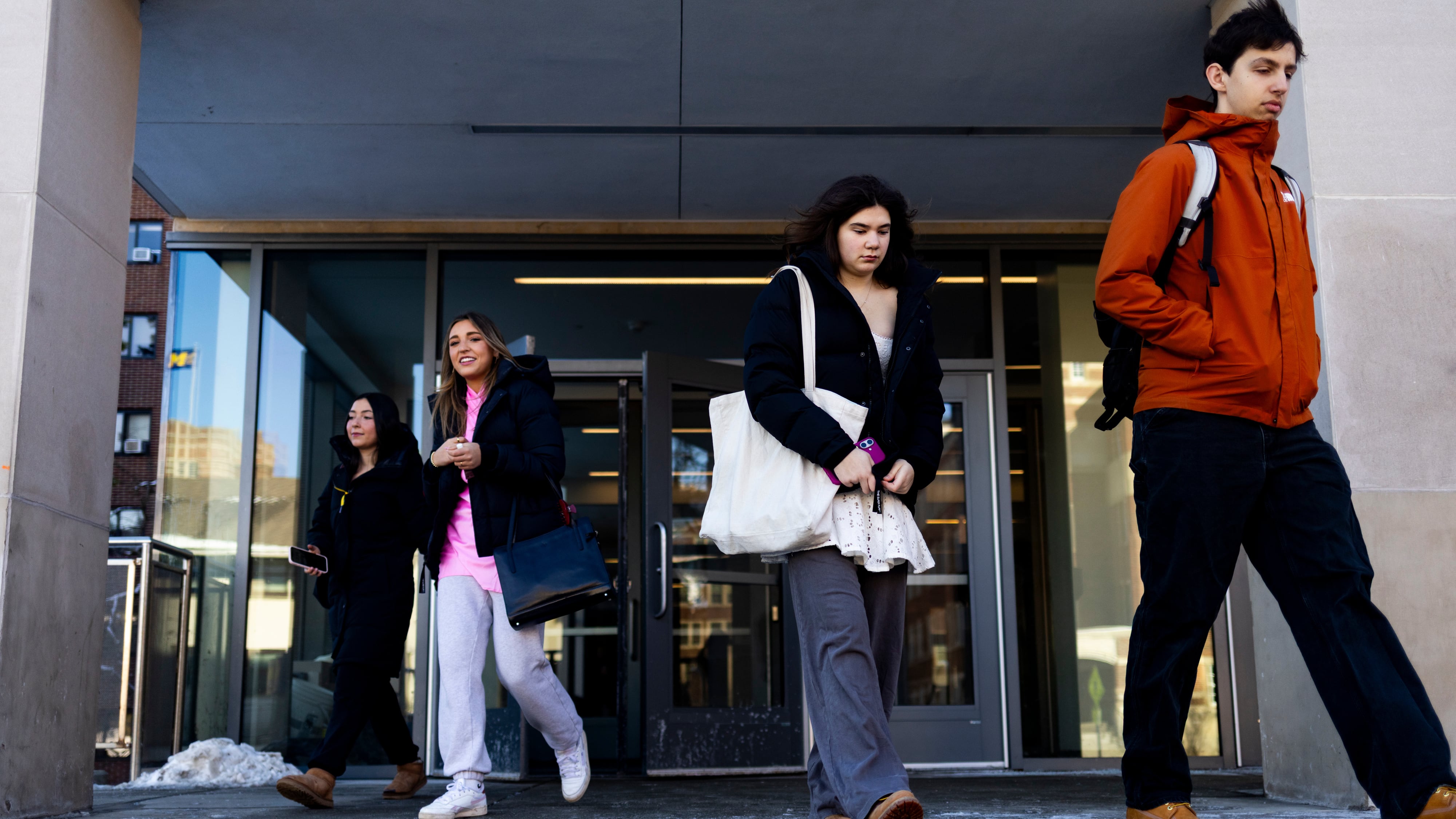 Students make their way around the University of Michigan campus in Ann Arbor, Mich., on Jan. 17, 2026. (Emily Elconin / AP Photo)
