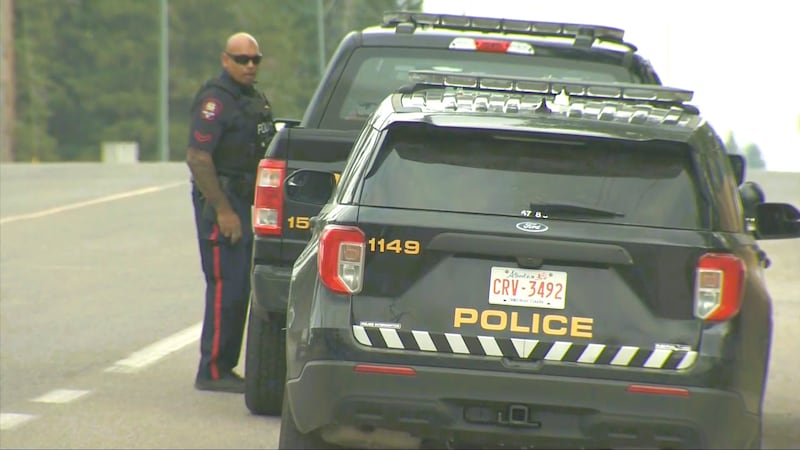 Emergency crews respond to an active-shooter incident that resulted in one officer being shot following a traffic stop in the southwest community of Spruce Cliff near Edworthy Park on Monday, Aug. 10, 2026.