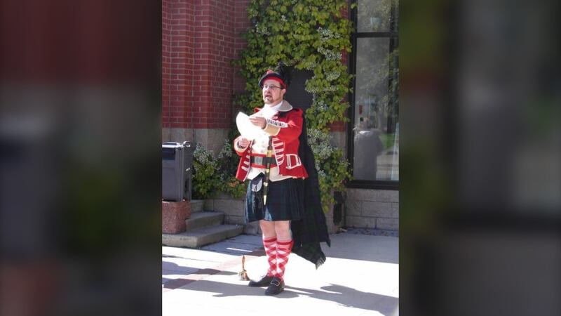 Town crier David Olie is pictured