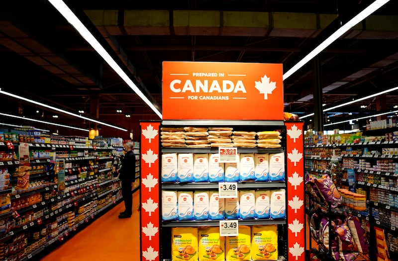 Products prepared in Canada are displayed prominently at the end of an aisle at a grocery store in Ottawa on April 2, 2025. (Justin Tang / The Canadian Press)