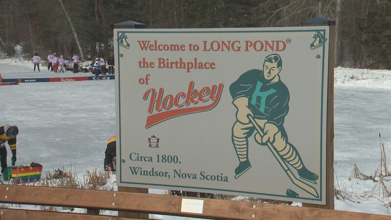 A sign is pictured reading: "Welcome to Long Pond. The birthplace of hockey."