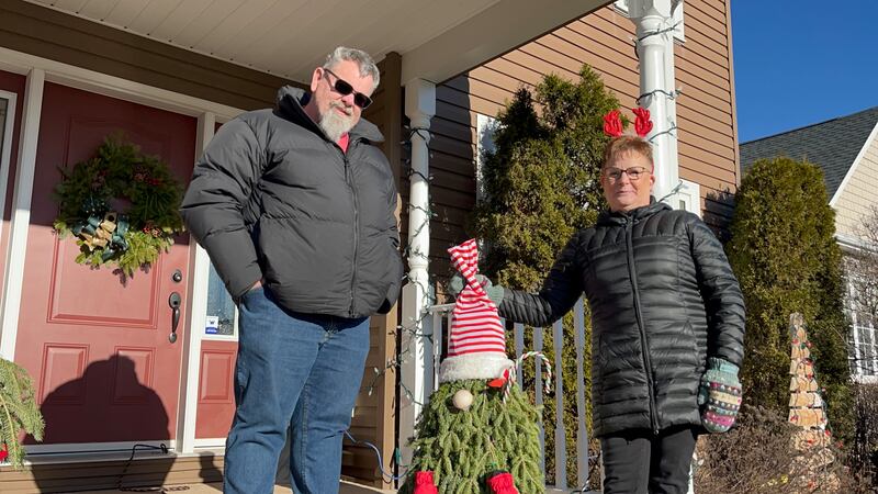 Liz MacLaughlan and Fred Sears pose with Gnome