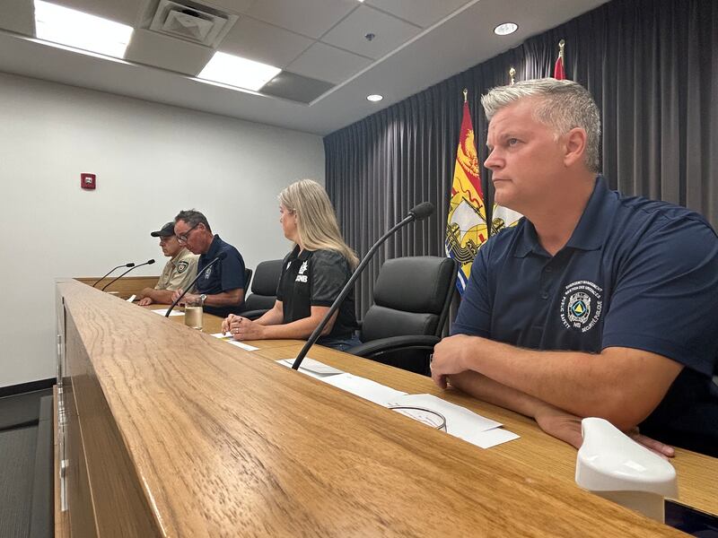 Public Safety Minister Robert Gauvin, Premier Susan Holt, Natural Resources Minister John Herron, and wildfire prevention officer Roger Collet are pictured at a news conference in Fredericton on Aug. 11, 2025.