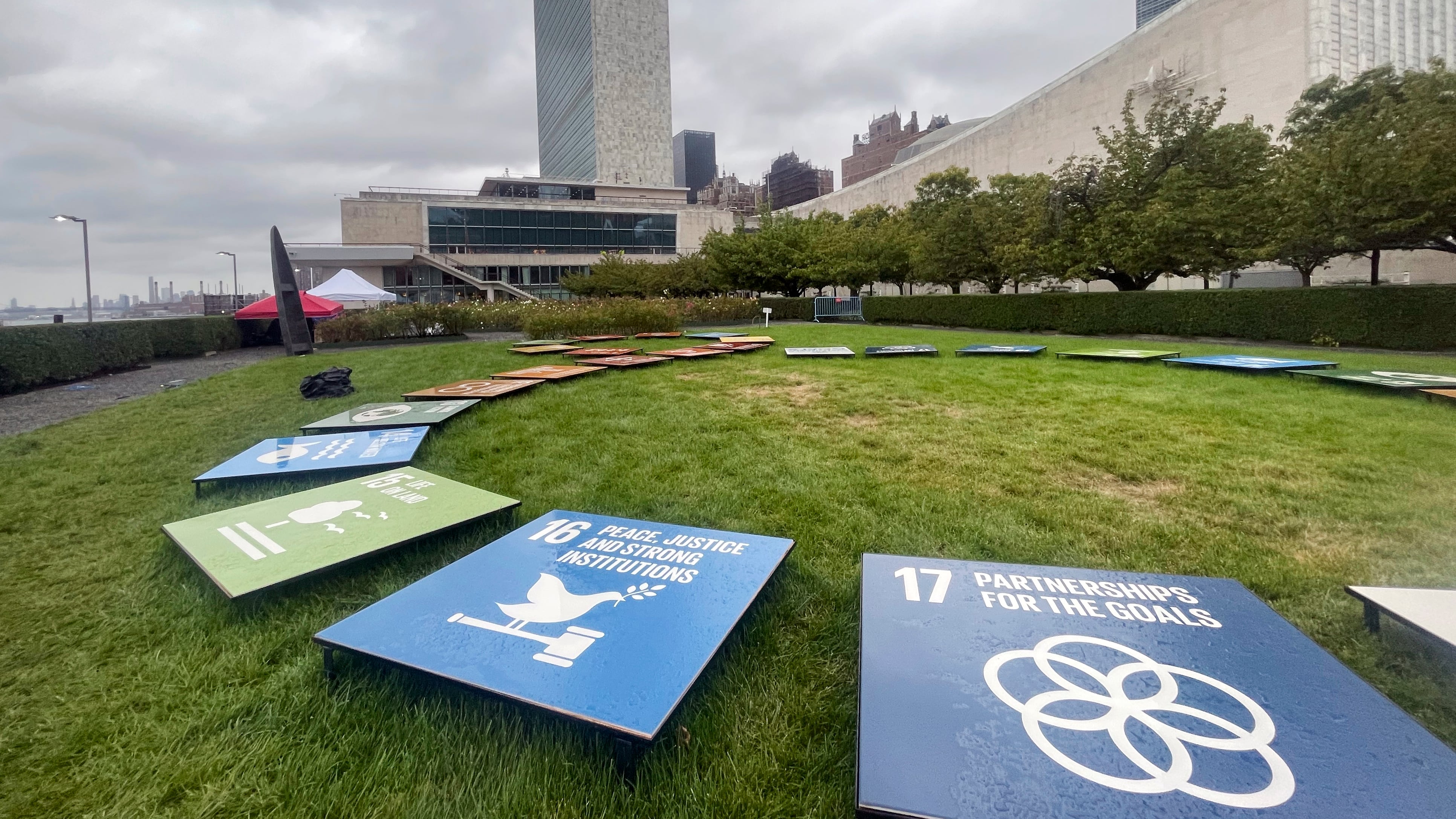 Tiles depicting the United Nations’ Sustainable Development Goals are displayed outside the UN General Assembly Hall at the United Nations on Sept. 23, 2023. (Ted Anthony / AP Photo)