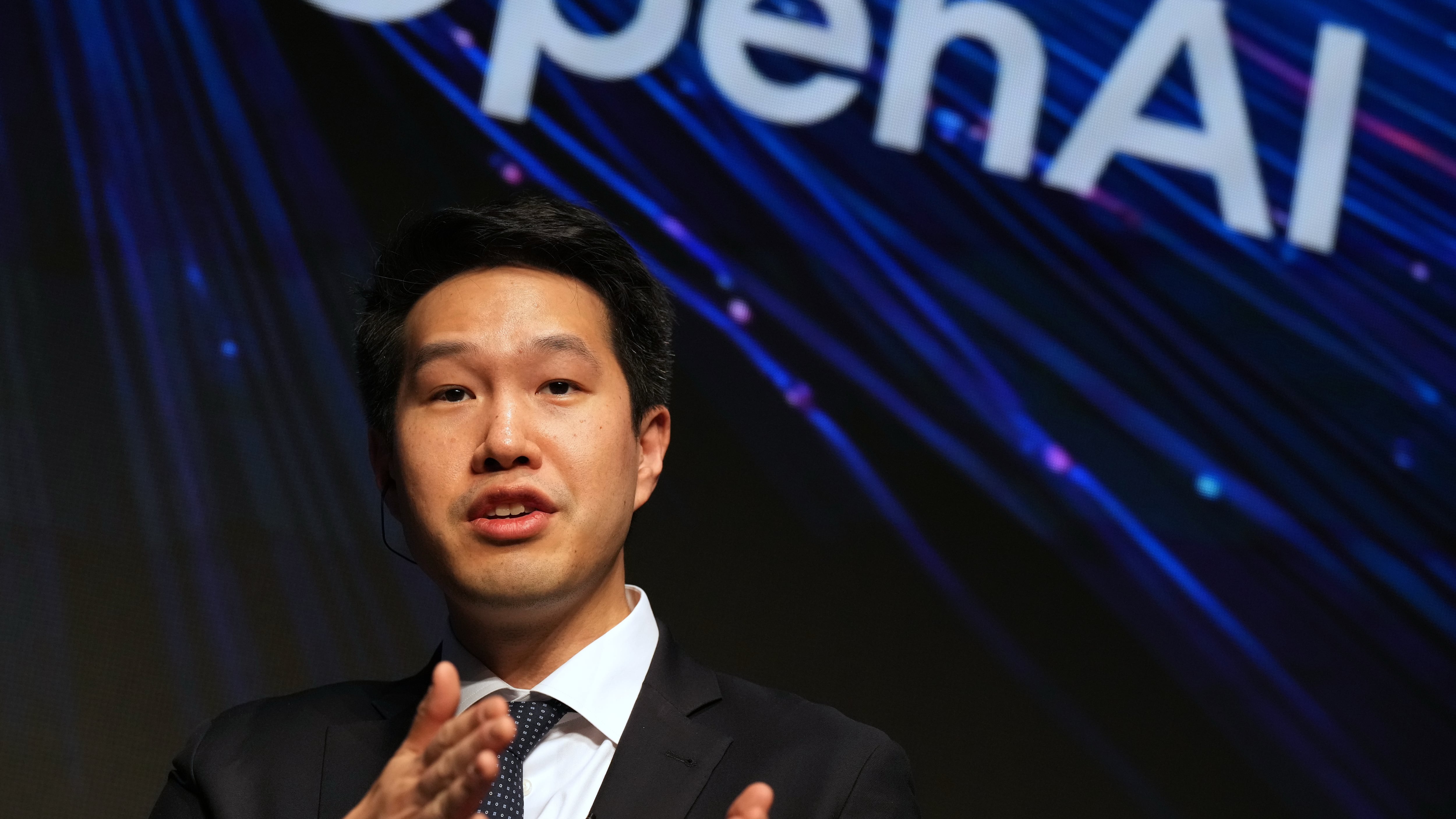 Mark Chen, chief research officer for OpenAI, speaks during a business event with SoftBank at a hotel in Tokyo on June 16, 2026. (Hiro Komae / AP Photo)
