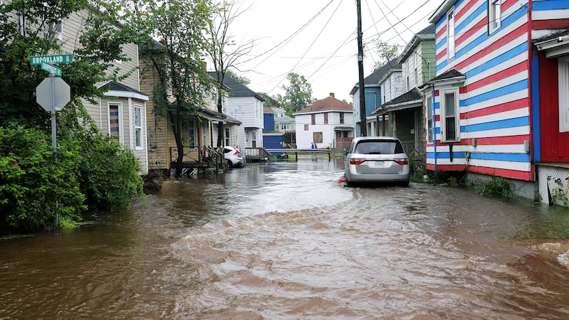 A flooded street is pictured.