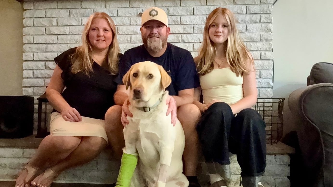 Reese is pictured with his family, Amanda, Chris and Emma McCurdy, in their home in Coldbrook, N.S. (Submitted)