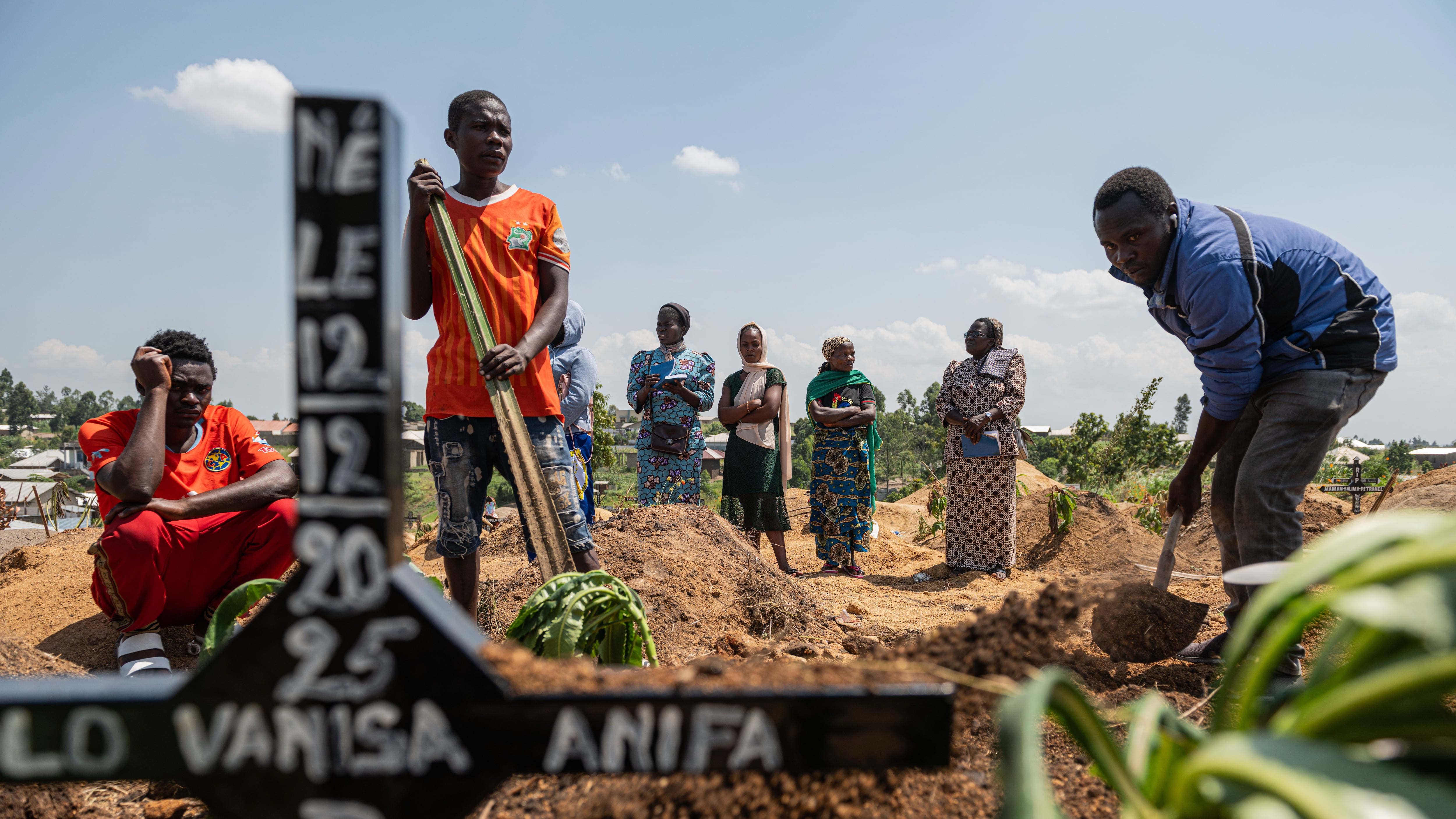 Relatives of Vanisa Anifa, a six-month-old orphaned girl who died of Ebola, attend her burial in Bunia, Democratic Republic of the Congo, on June 19, 2026. (Moses Sawasawa / AP Photo)