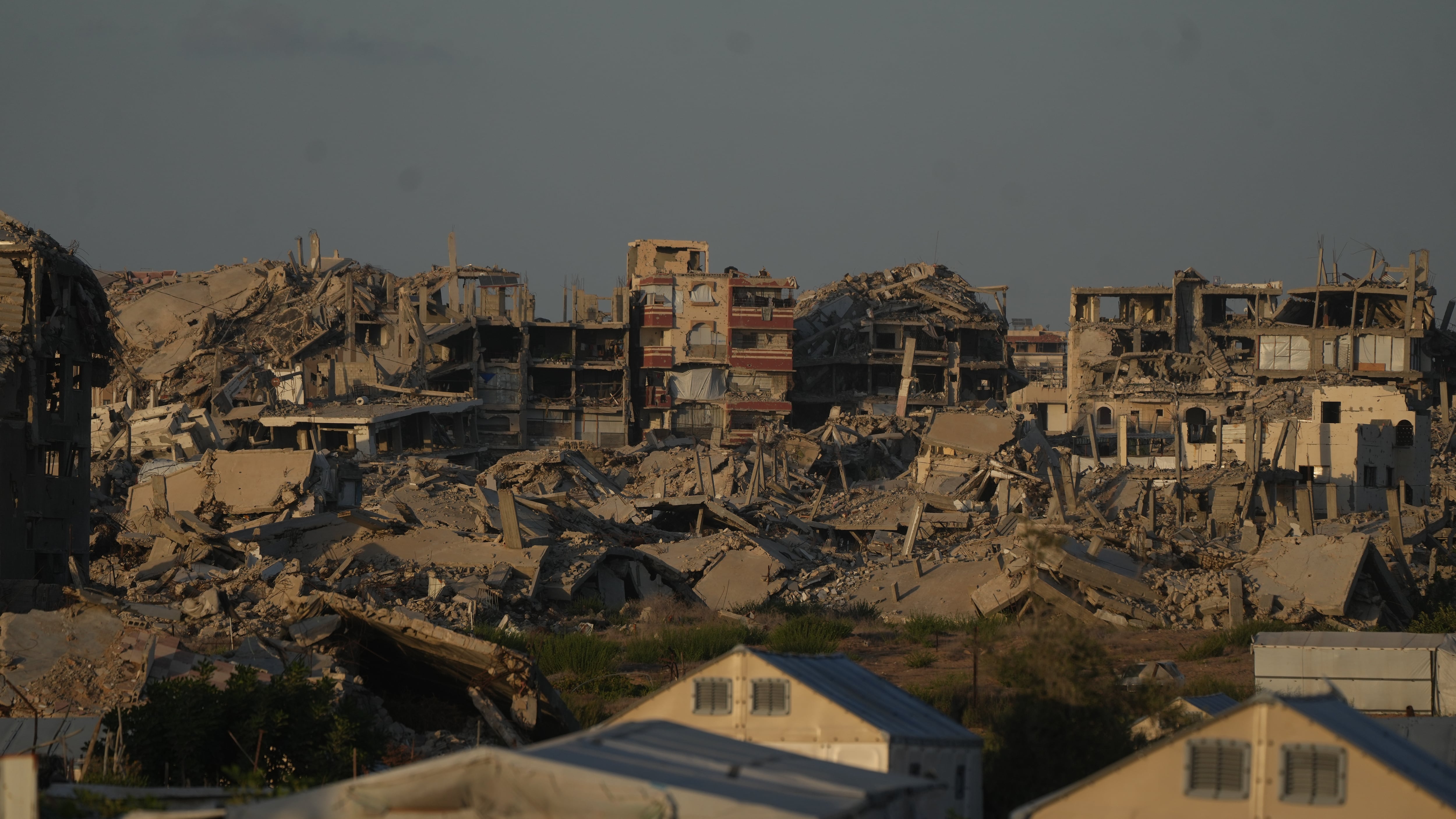 Buildings destroyed by Israeli military strikes during the Israel-Hamas war are seen in Gaza City on Oct. 8, 2026. (Jehad Alshrafi / AP Photo)