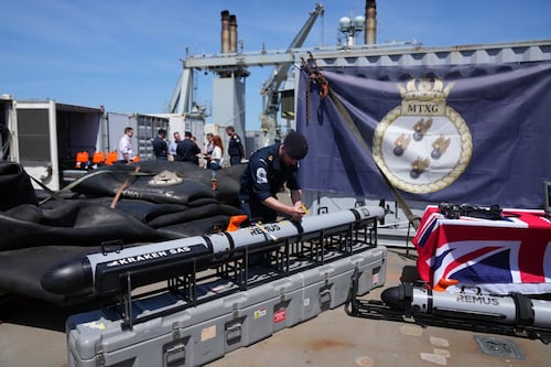 Britain's navy prepares to clear mines in the Strait of Hormuz while waiting for a peace deal