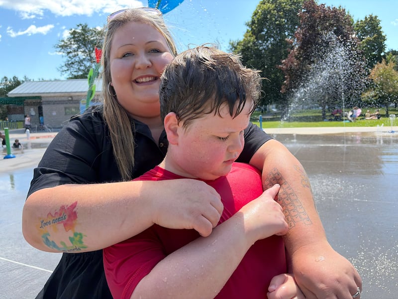 Jessica Fletcher and her son Hunter Fletcher are pictured, showing Hunter using the keyboard tattoo (Anna Mandin / CTV News Atlantic)