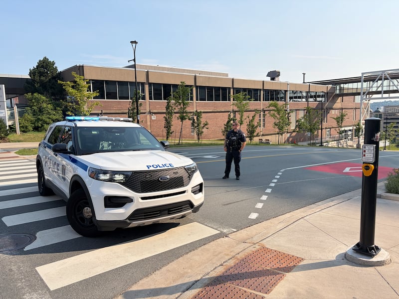 A police officer blocks traffic in downtown Halifax on Aug. 10, 2026. (Mike Lamb/CTV Atlantic)