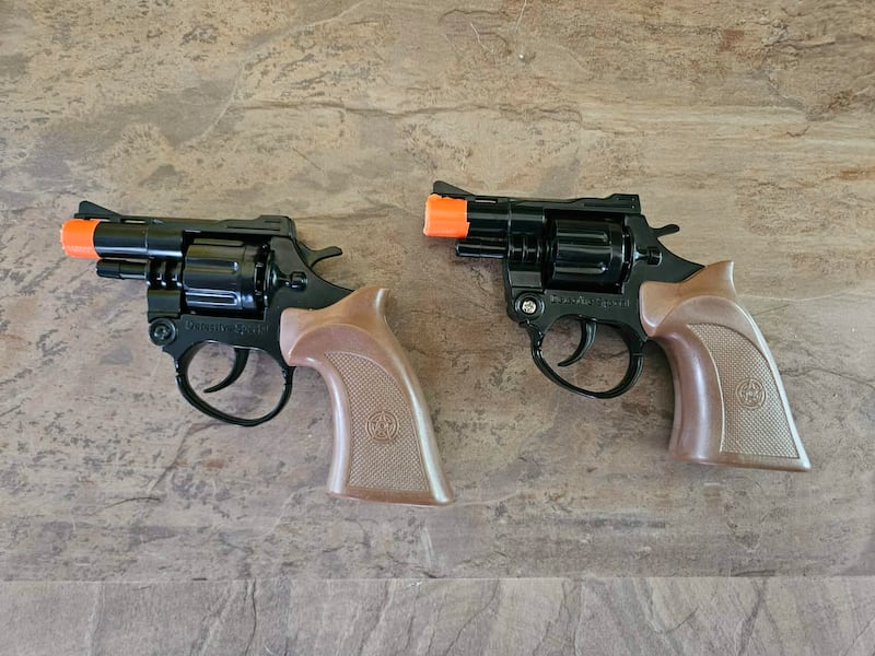 Two plastic firearms are pictured. (Courtesy: JB Vanier)