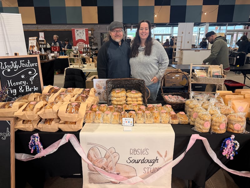 Debra and Rocco Flores are seen at the Rosie's Sourdough Studios stand. (Brianne Foley/CTV Atlantic)