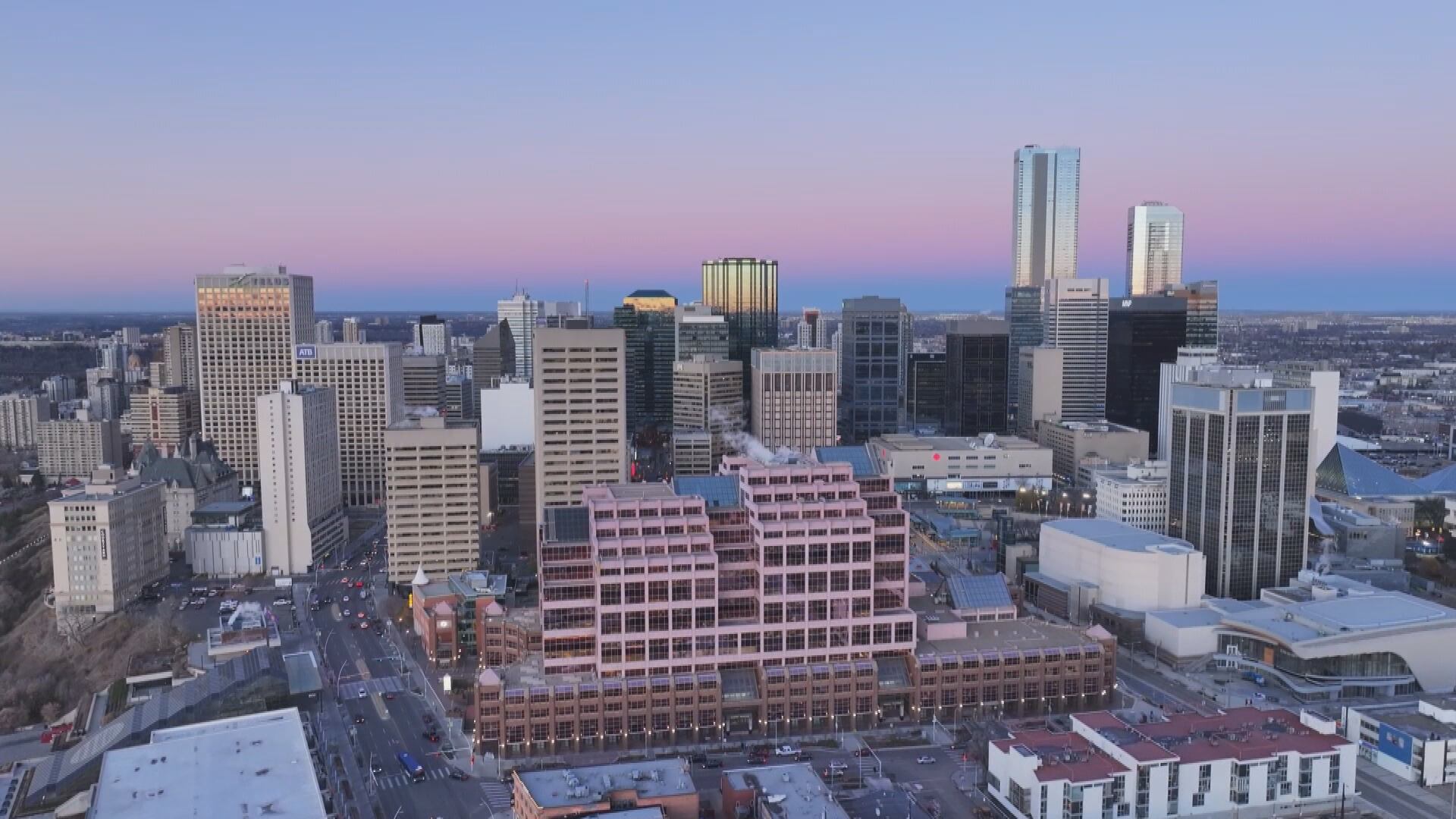 Sunrise colours the sky over downtown Edmonton pink on Nov. 4, 2025. (Cam Wiebe / CTV News Edmonton)