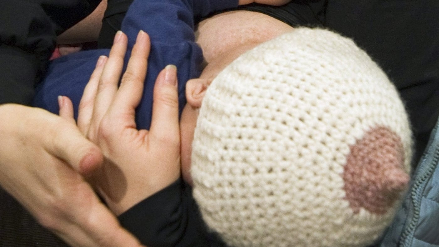 A woman nurses her baby in Montreal, on Wednesday, January 19, 2011. THE CANADIAN PRESS/Ryan Remiorz