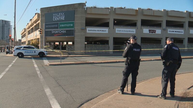 Police are stationed outside the Halifax Shopping Centre parkade.