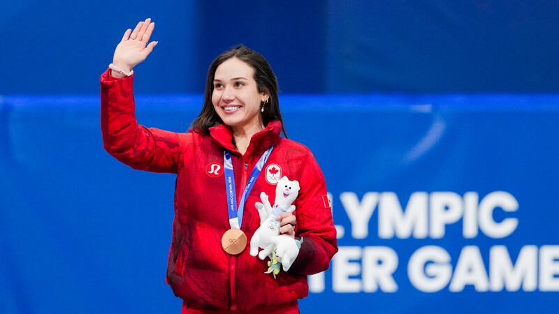 Team Canada's Courtney Sarault celebrates after winning a bronze medal in 500m finals at the Milan Cortina 2026 Olympic Winter Games in Italy on Thursday, February 12, 2026. (THE CANADIAN PRESS/Handout - COC, Leah Hennel)