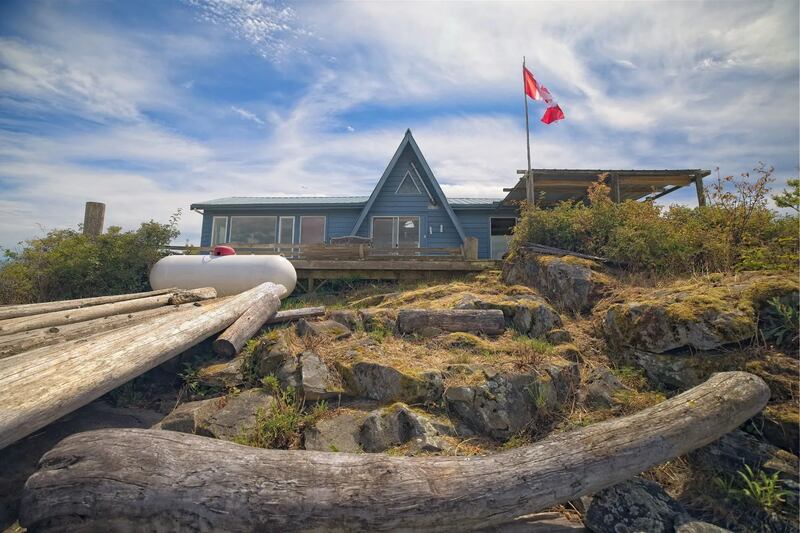 The private island listing describes the roughly half-acre property as a “rare opportunity to turn back time” with a pristine shoreline and private beaches right outside the front door. (Sotheby’s International Realty Canada)