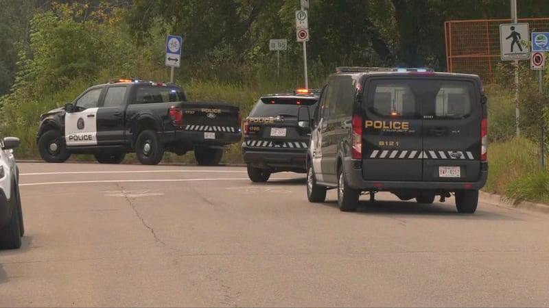 Emergency crews respond to an active-shooter incident that resulted in one officer being shot following a traffic stop in the southwest community of Spruce Cliff near Edworthy Park on Monday, Aug. 10, 2026.