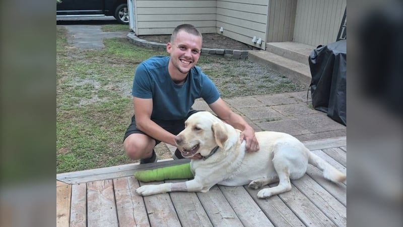 Ian, of the firefighters who helped rescue Reese, is pictured with the pup at his home in Coldbrook, N.S. (Submitted)