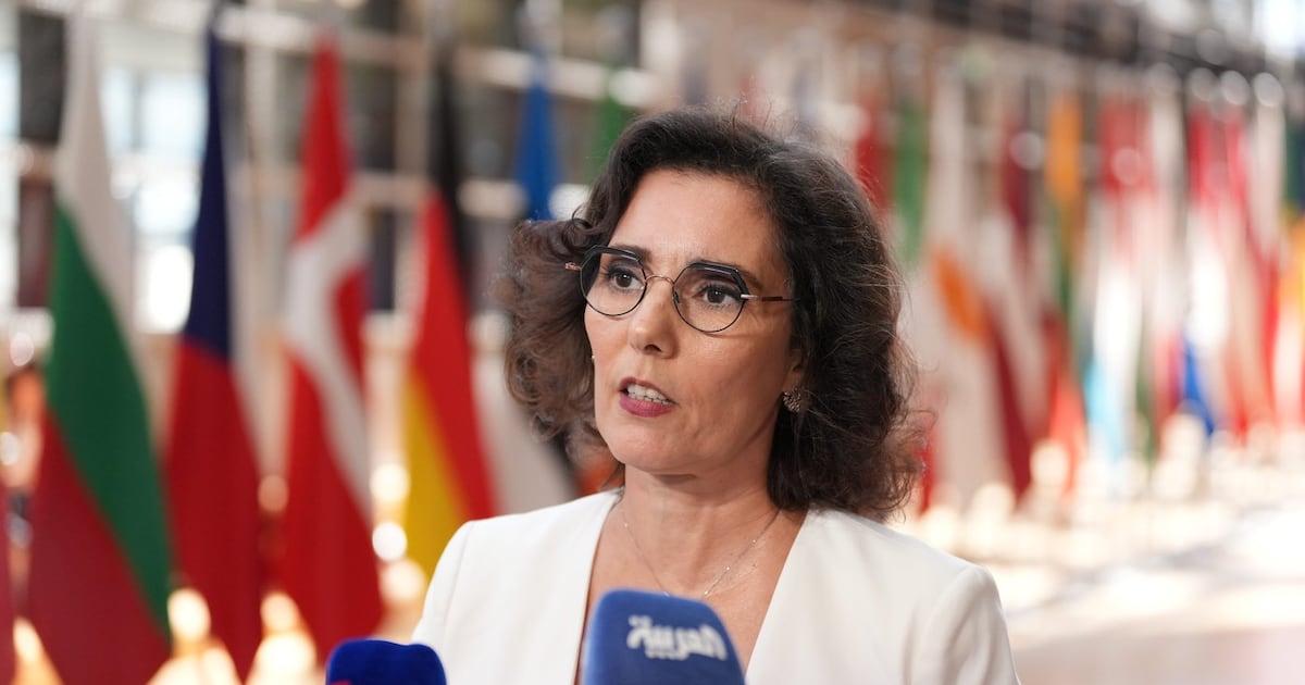European Commissioner for Preparedness and Crisis Hadja Lahbib speaks with the media as she arrives for a meeting of EU foreign ministers in Brussels, Monday, July 13, 2026. (AP Photo/Marius Burgelman)