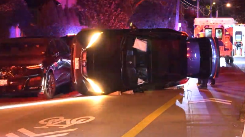 Driver crashed into parked cars before rolling over in Toronto’s west end: police