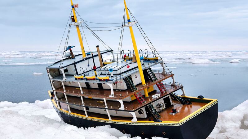 A miniature boat is pictured.