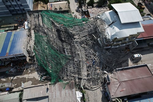Building under construction in Philippines collapses, leaving 1 dead and 21 trapped