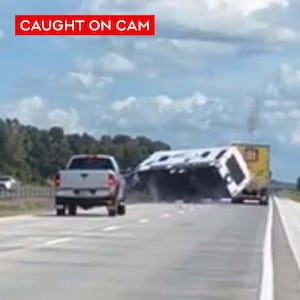 Moment of dramatic crash between a camper and pickup truck on Highway 401