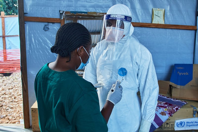 Health workers interact at the Evangelical Medical Center in Bunia, eastern Congo, on July 3, 2026, where Ebola clinical trials are scheduled to take place. (Dirole Lotsima Dieudonne / AP Photo)