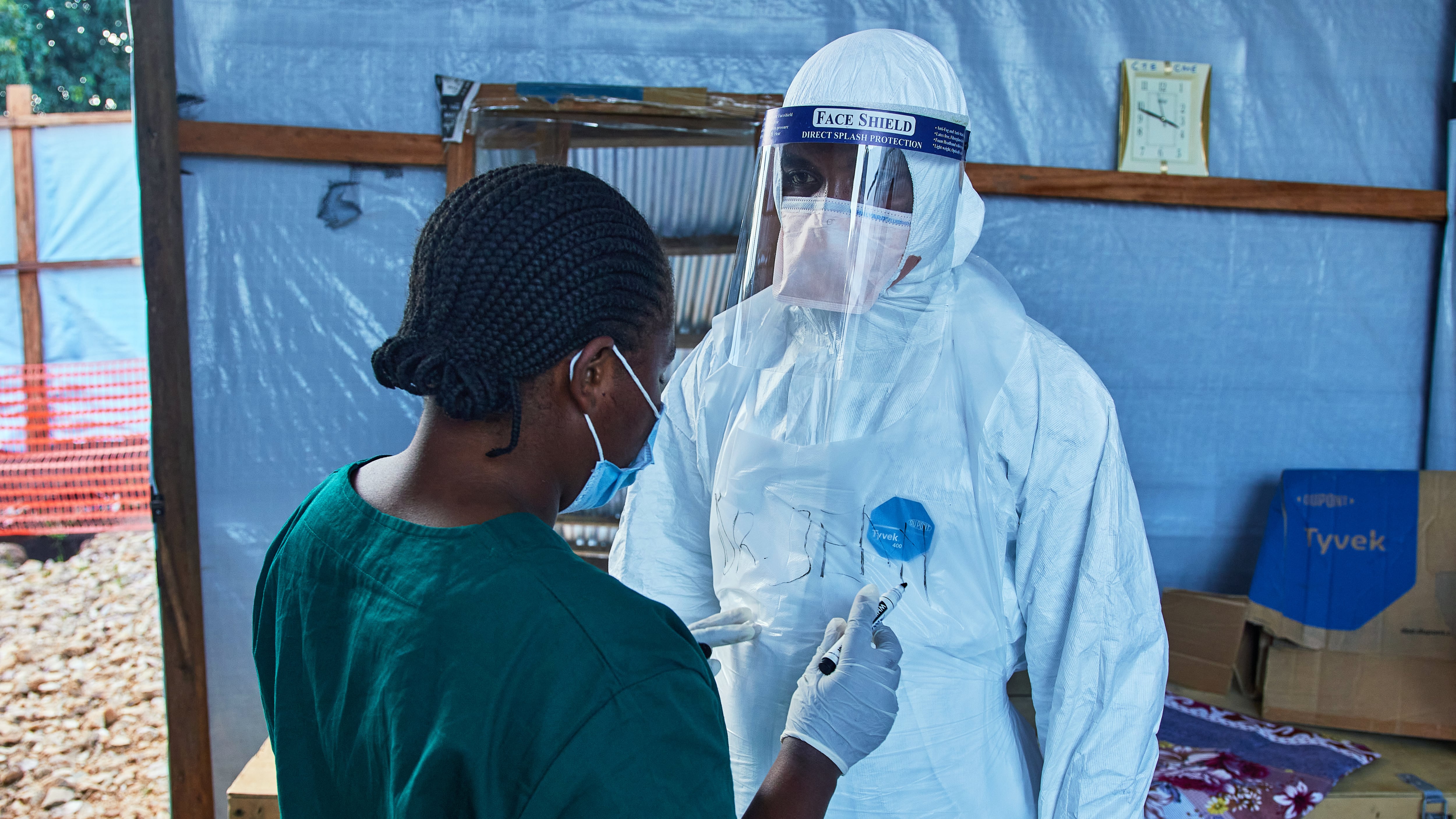 Health workers interact at the Evangelical Medical Center in Bunia, eastern Congo, on July 3, 2026, where Ebola clinical trials are scheduled to take place. (Dirole Lotsima Dieudonne / AP Photo)