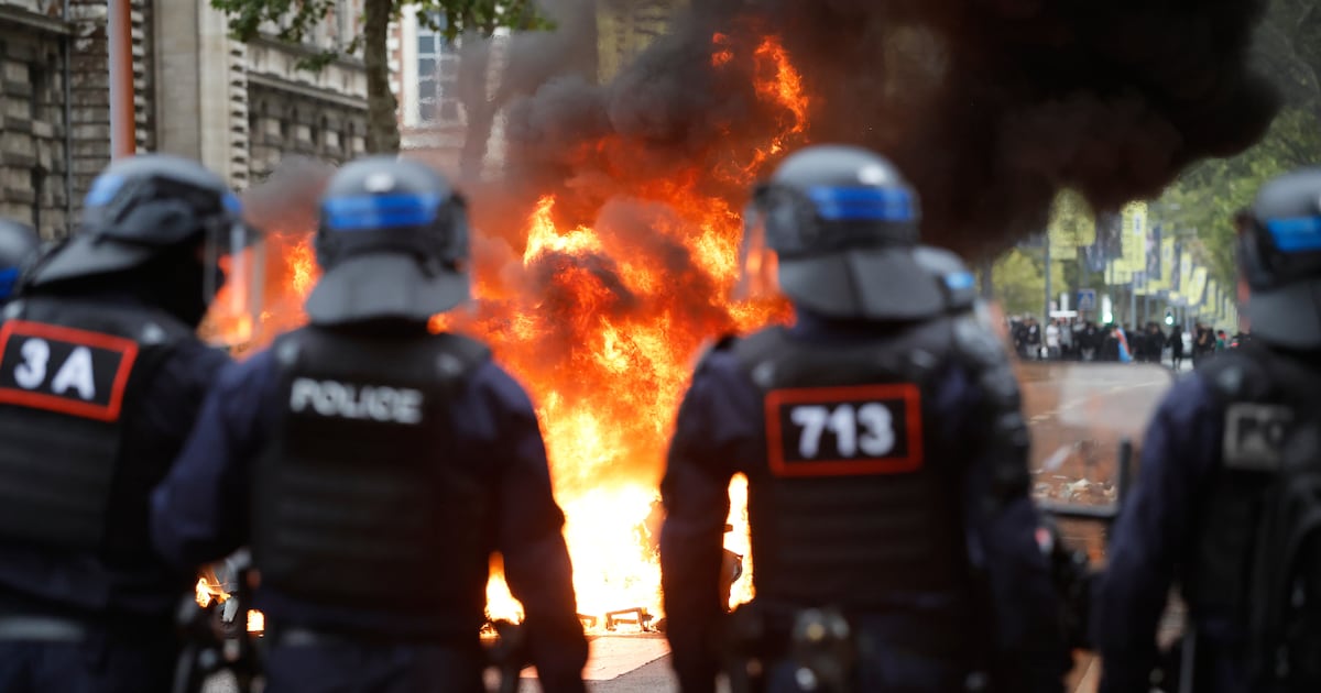 Photo: CP24 High school students burn garbage as they protest to demand more resources for schools, in Lille, France, Wednesday, Sept