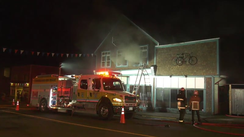 Heavy smoke rises from a historic Cumberland building during a fire Sunday night. (Gord Kurbis)