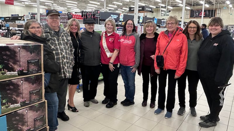 Friends, family and co-workers gathered to celebrate Martha MacIsaac's 50th anniversary at the Canadian Tire in Sydney, N.S., on May 12, 2026. (Ryan MacDonald/CTV News Atlantic)