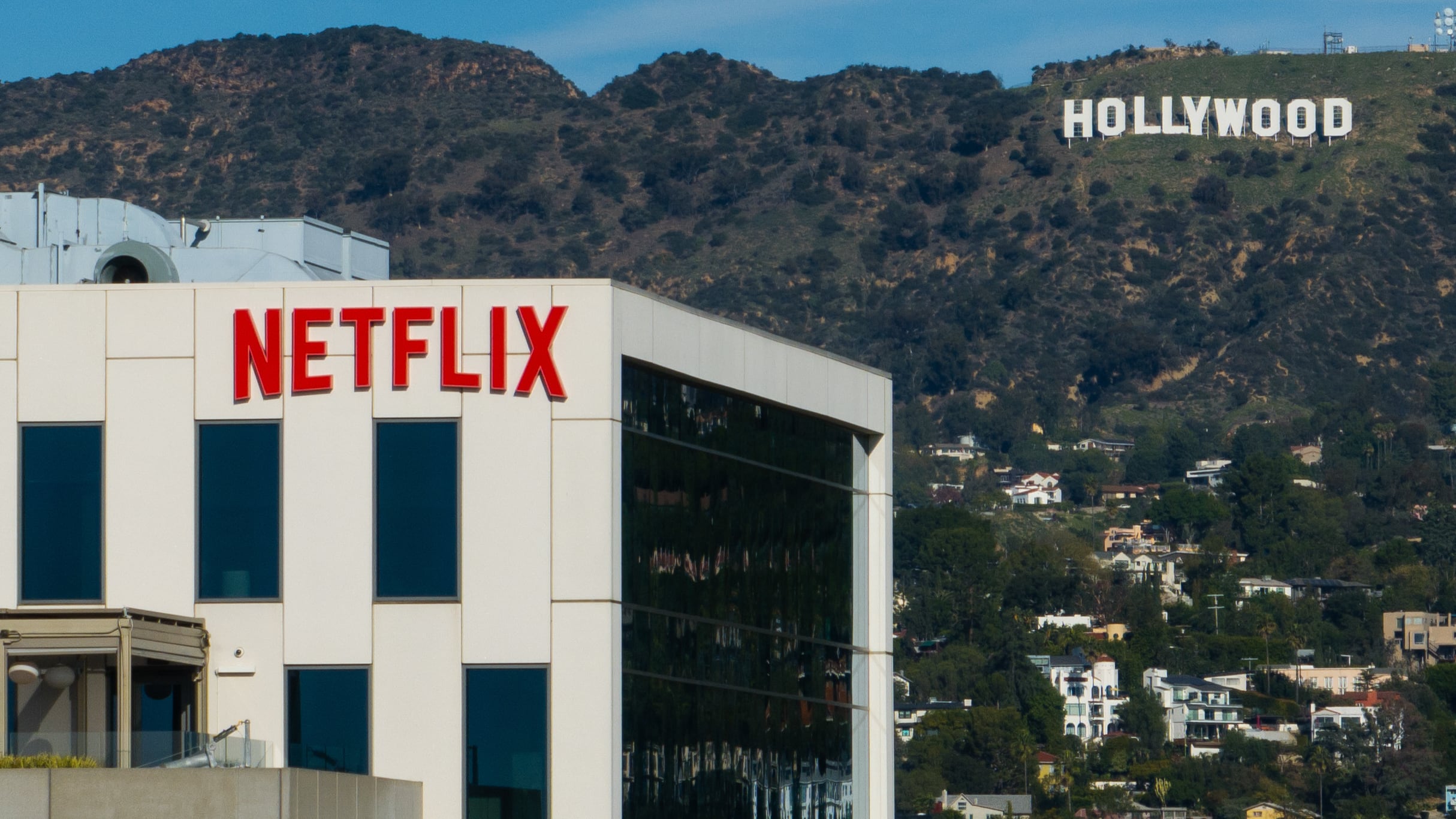 A Netflix sign is displayed atop a building in Los Angeles on Dec. 18, 2025. (Jae C. Hong / AP Photo)