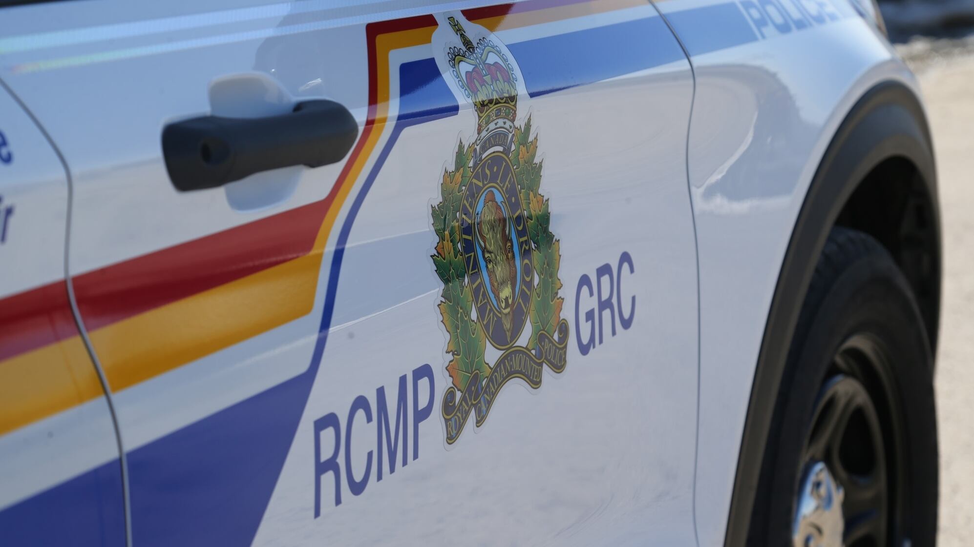 An RCMP cruiser is pictured with the logo painted on the side. (Source: Facebook)
