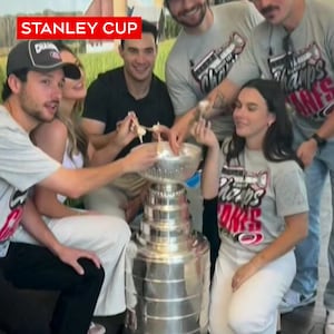 Hurricanes’ Sean Walker eats ice cream out of the Stanley Cup in Newmarket