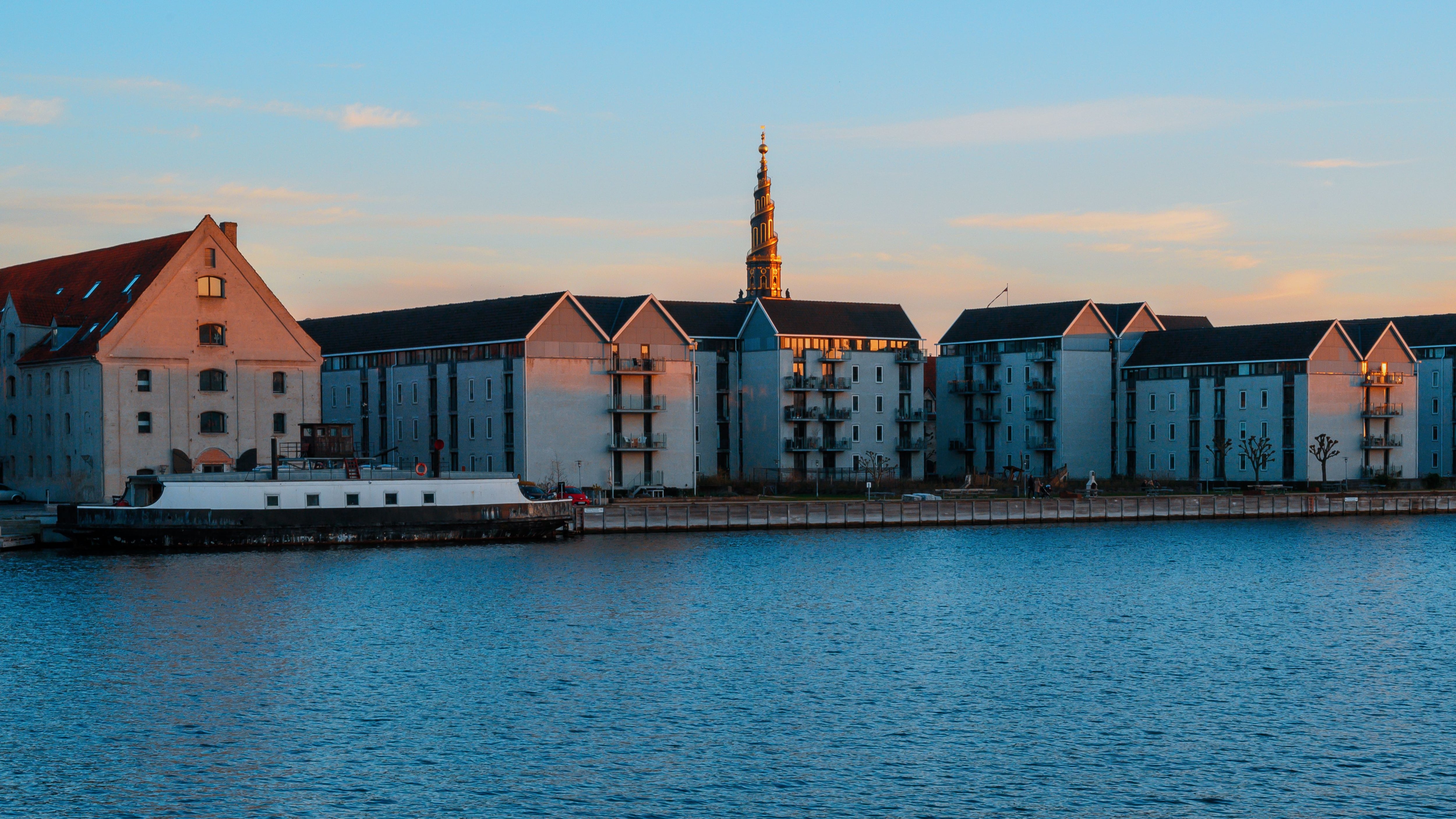 Waterfront residential buildings are pictured in Copenhagen during sunset in this undated photo. (Pexels)