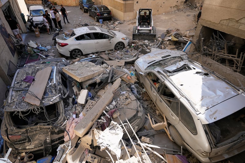 Israel strikes Beirut and kills at least 14 people