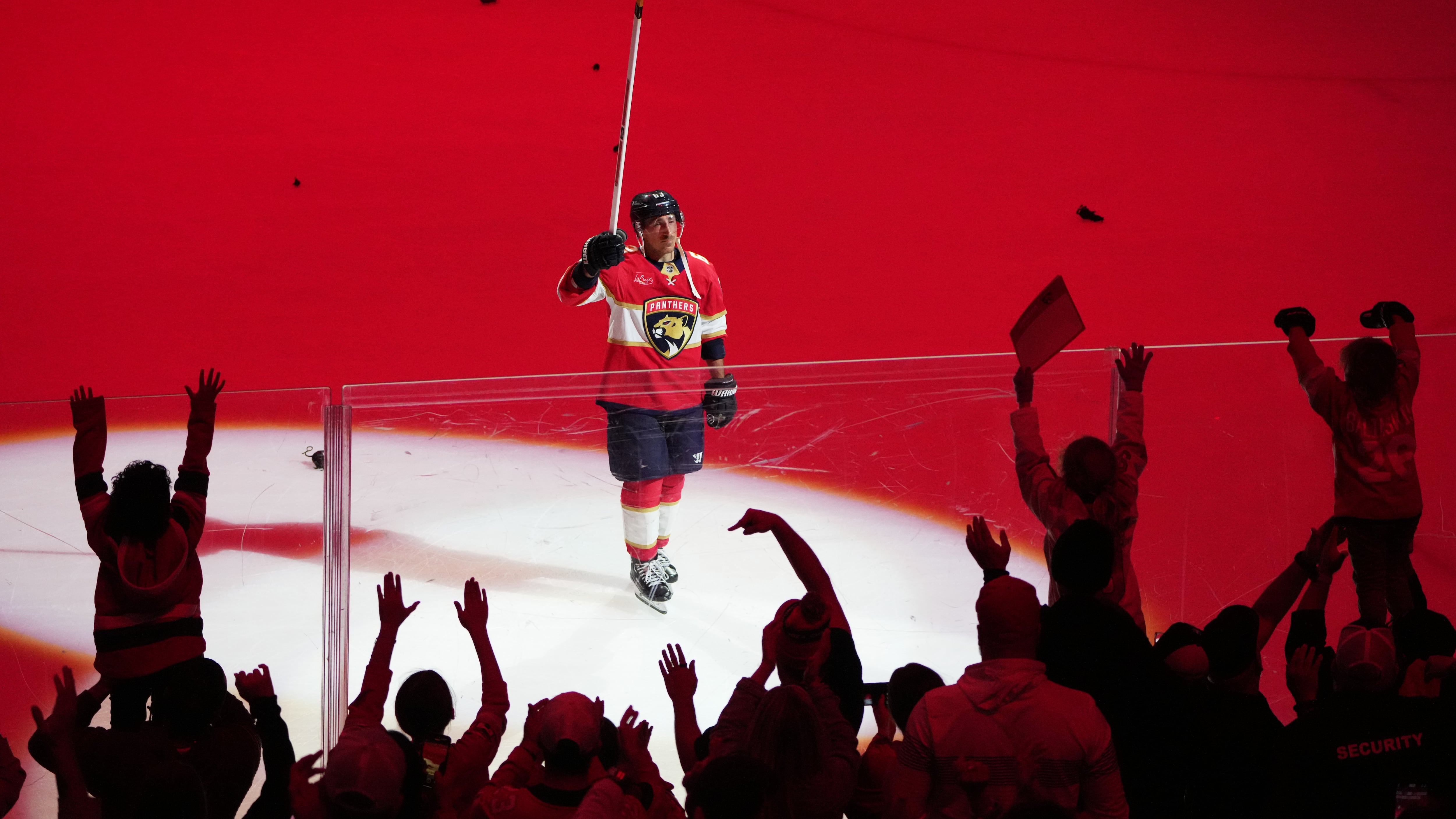 Florida Panthers left wing Brad Marchand acknowledges the crowd after the Panthers defeated the Dallas Stars in a shootout in an NHL hockey game, Saturday, Nov. 1, 2025, in Sunrise, Fla. (AP Photo/Lynne Sladky)