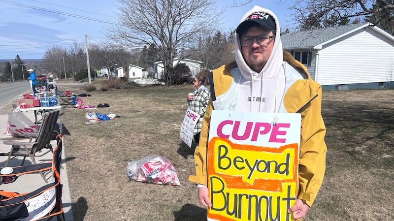 Striking long-term care workers are seen outside Harbourstone Advanced Care on Kenwood Drive in Sydney River, N.S., on April 13, 2026. (Ryan MacDonald/CTV News Atlantic)