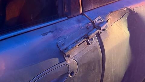 The early model Acura featured makeshift modifications, including rebar and duct tape in place of a rear window, and a welded gate latch to secure the driver-side door. (Handout)