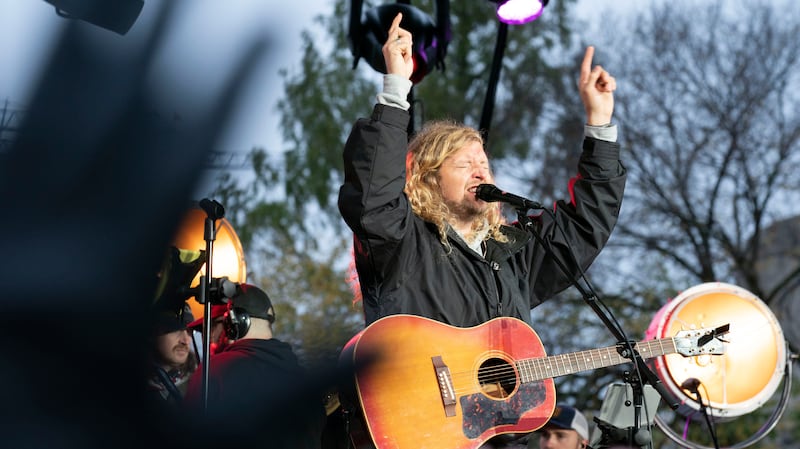 Christian musician Sean Feucht of California sings during a rally at the National Mall in Washington, Sunday, Oct. 25, 2020. (AP Photo/Jose Luis Magana)